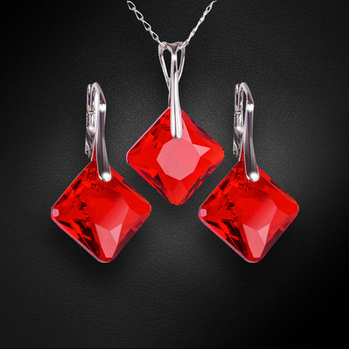Серебряный комплект "Блеск (Light Siam)" с кристаллами Swarovski™